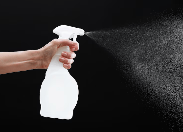 male hand spraying water