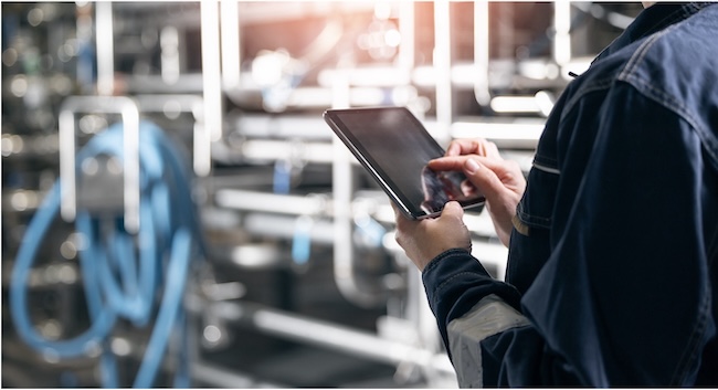 man holding a tablet